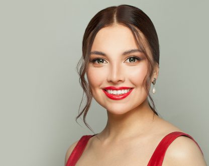 Cute girl is smiling happily